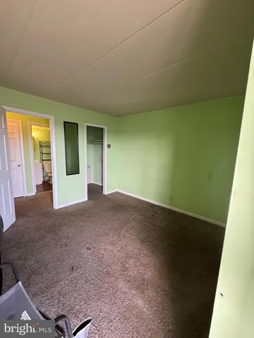 a kitchen with a sink a stove and cabinets