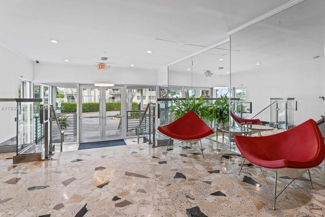 1450 Lincoln Road, Unit 307 Miami Beach, FL 33139 - Photo 16 of 18 a view of a dining room with furniture
