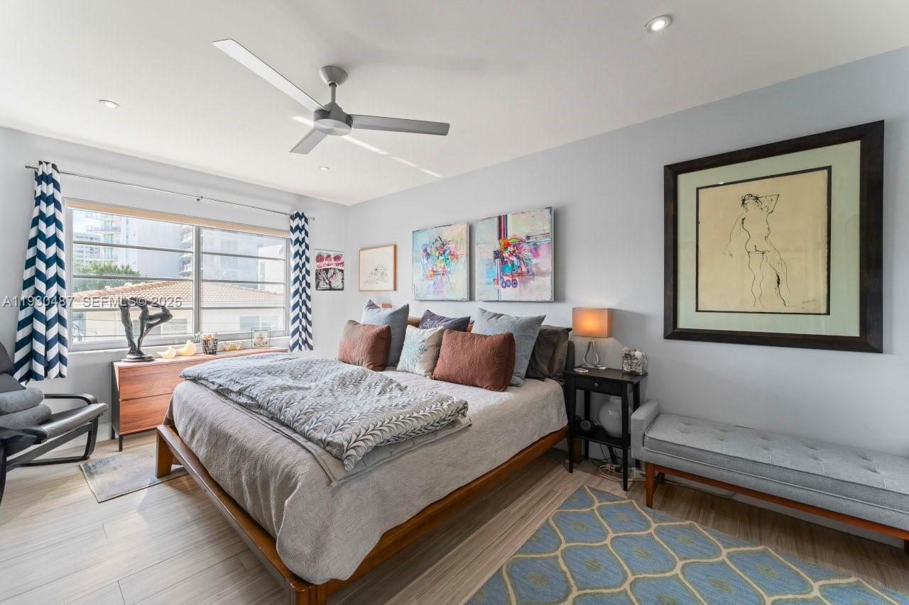 1450 Lincoln Road, Unit 307 Miami Beach, FL 33139 - Photo 10 of 18 a bedroom with a bed and a window