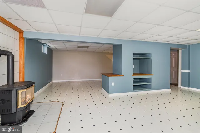 a view of a big room with wooden cabinets