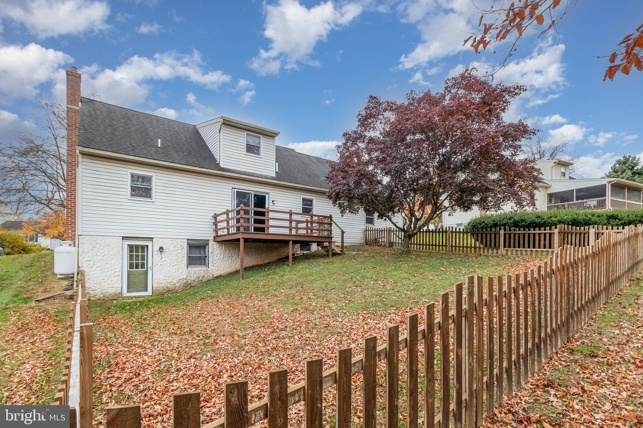 545 Wood View Drive Lititz, PA 17543 - Photo 28 of 38 a view of a house with wooden fence next to a yard