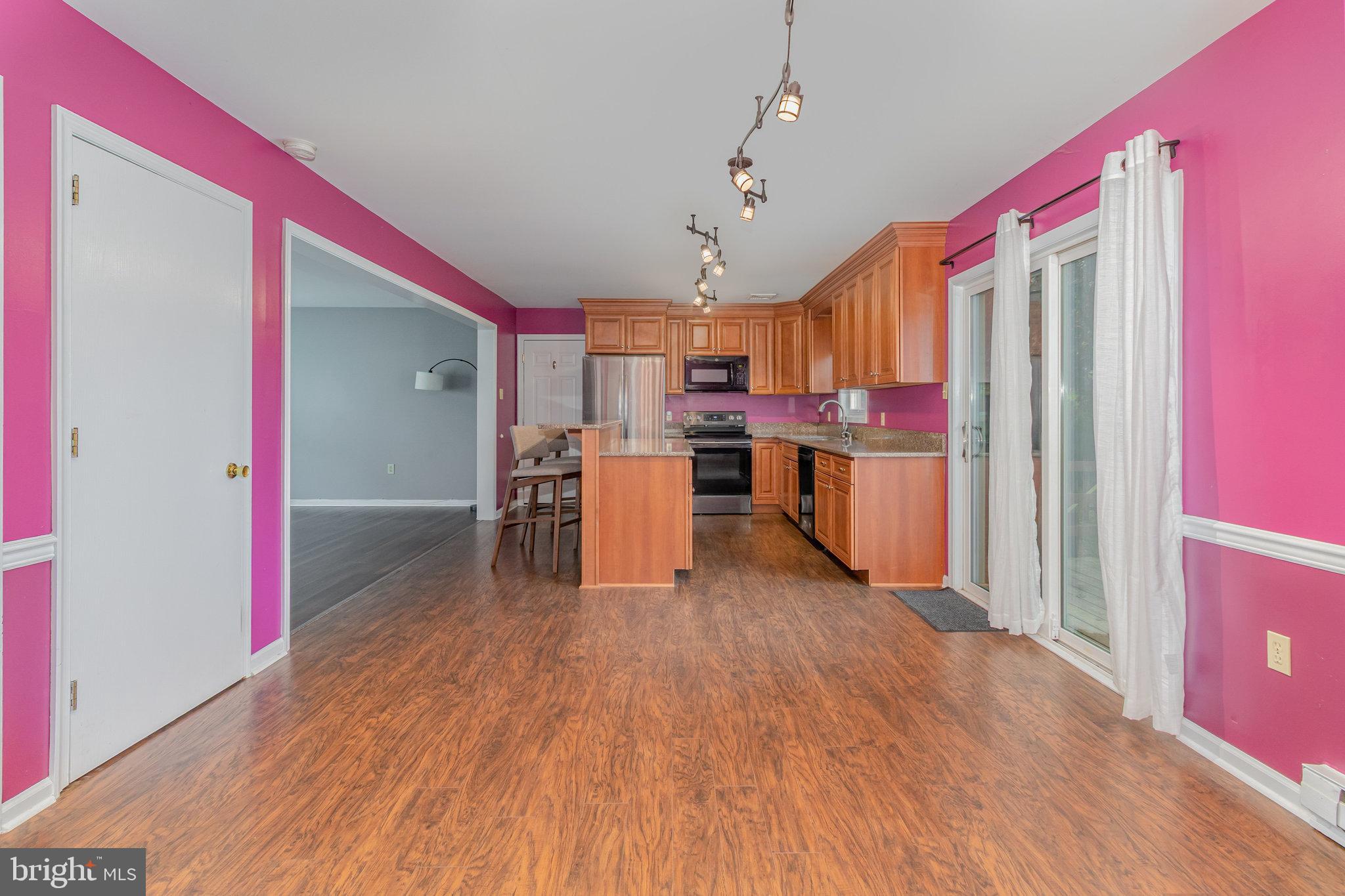 545 Wood View Drive Lititz, PA 17543 - Photo 8 of 38 a open kitchen with stainless steel appliances granite countertop a refrigerator and microwave
