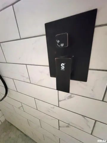 a bathroom with a sink and a shower