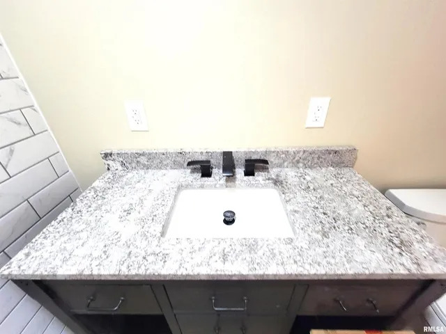 a wall with a close up of bulb