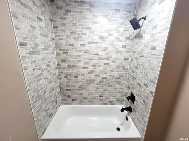 a view of a hallway with a white walls