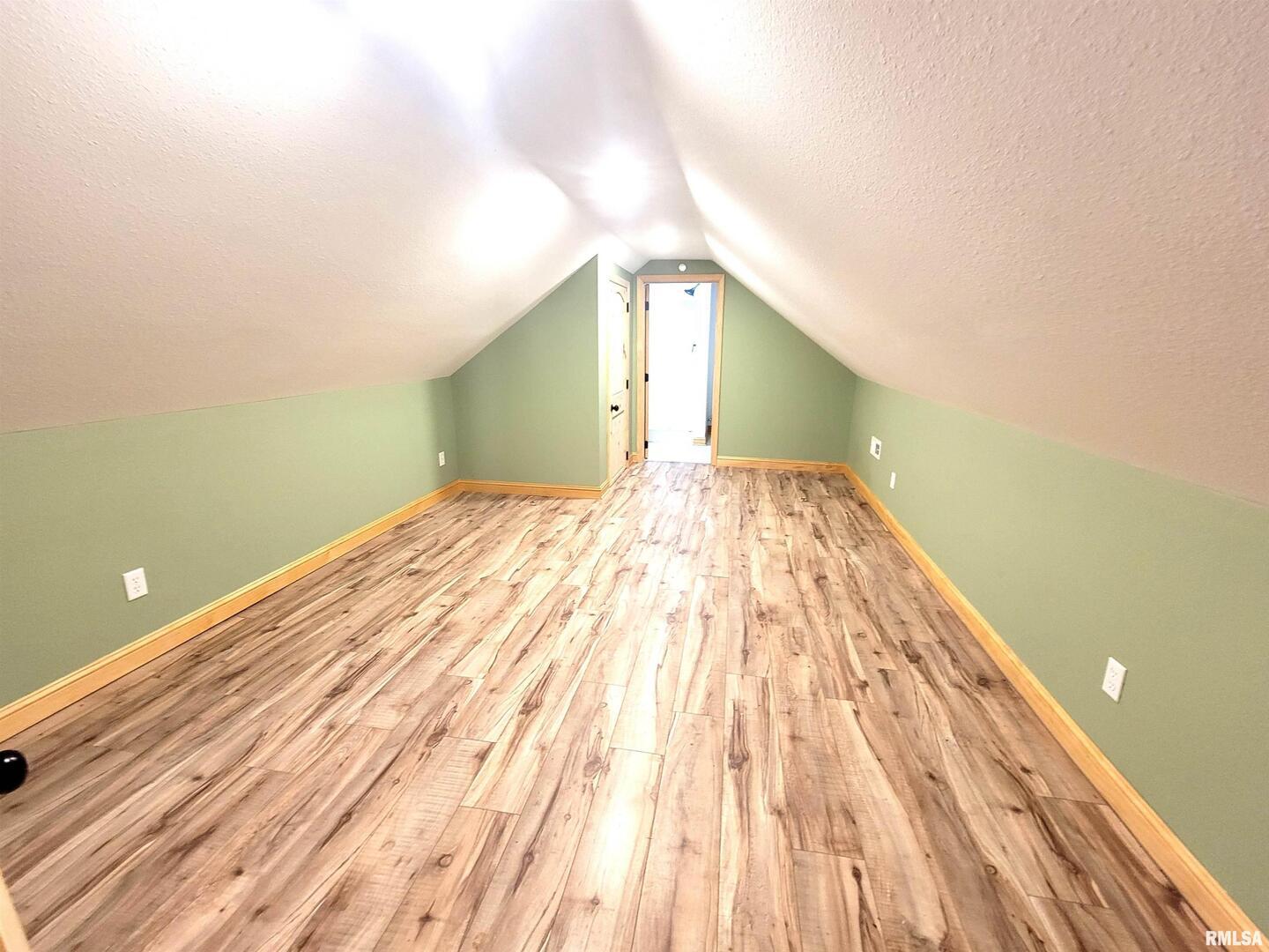 7324 State Rte 161 Extension Iuka, IL 62849 - Photo 35 of 78 a view of empty room with wooden floor