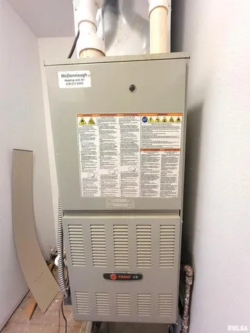 a living room with furniture fireplace and flat screen tv