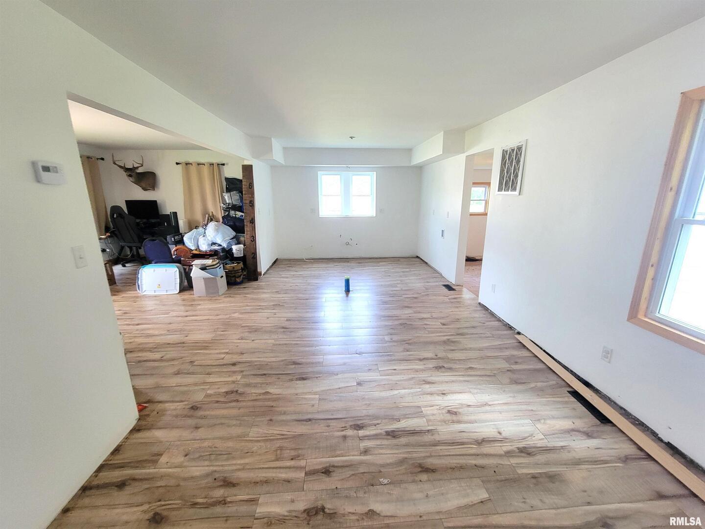 7324 State Rte 161 Extension Iuka, IL 62849 - Photo 51 of 78 a view of a livingroom with hardwood floor and a window