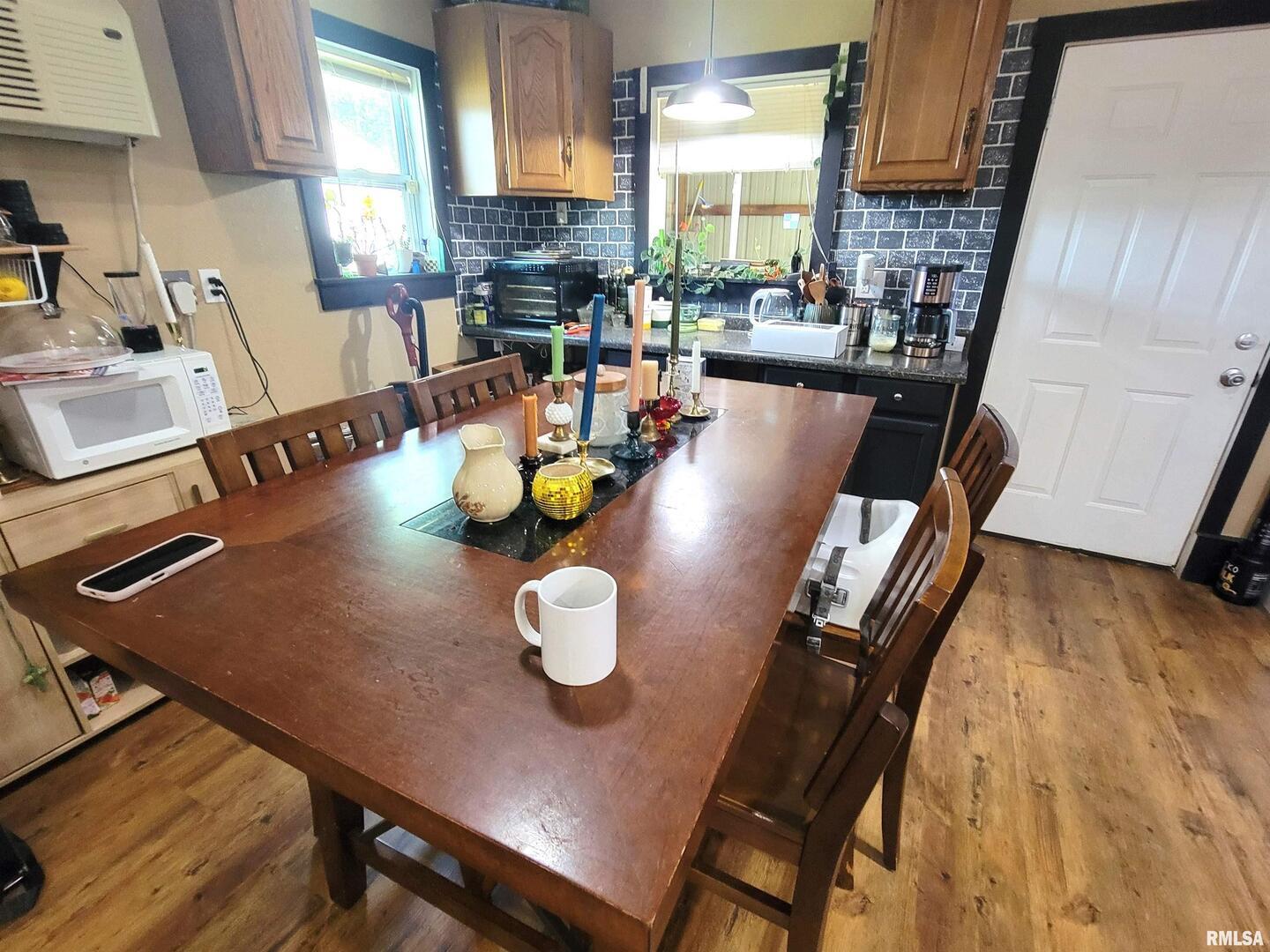 7324 State Rte 161 Extension Iuka, IL 62849 - Photo 66 of 78 a view of a dining room with furniture and a window