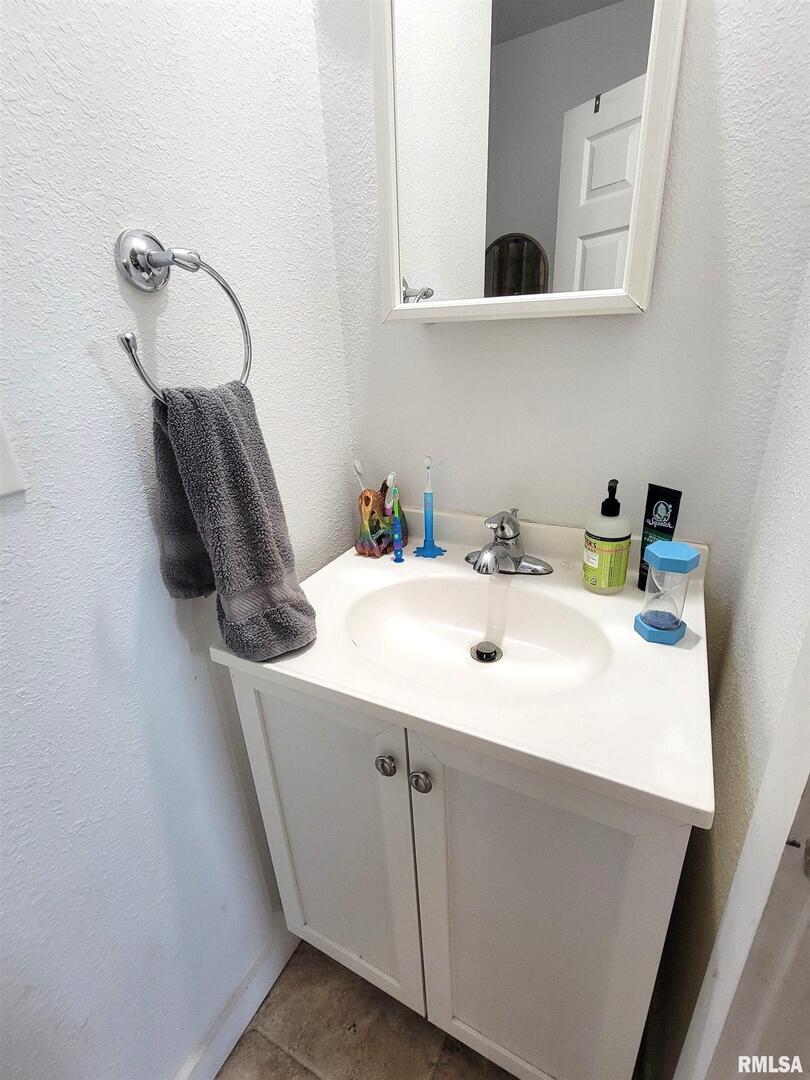 7324 State Rte 161 Extension Iuka, IL 62849 - Photo 71 of 78 a bathroom with a sink and a mirror