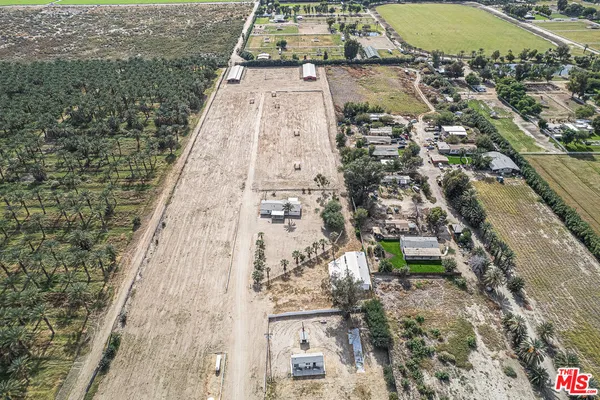 a view of house with yard
