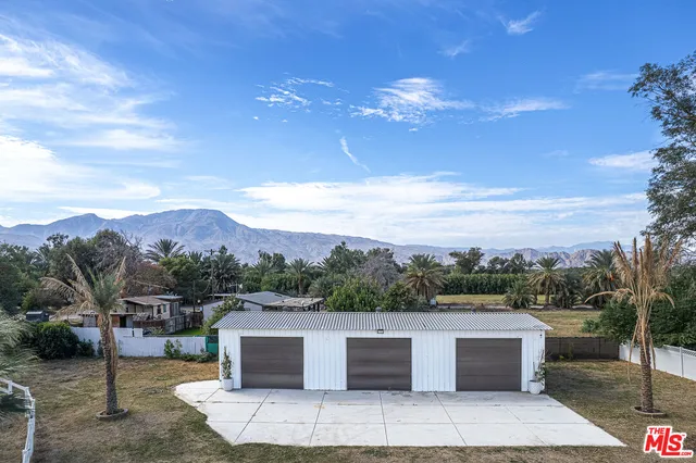 a kitchen with stainless steel appliances granite countertop a sink and stove