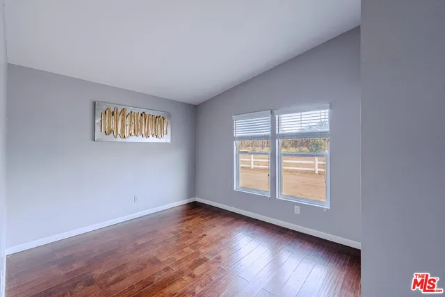a view of a livingroom with furniture and window