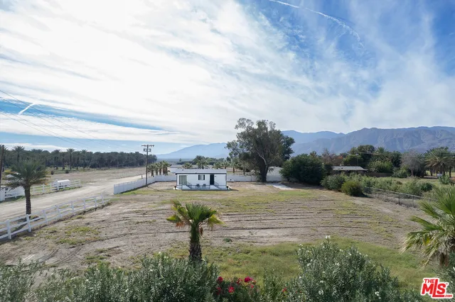 a view of a bathroom with a sink lake and mountain view