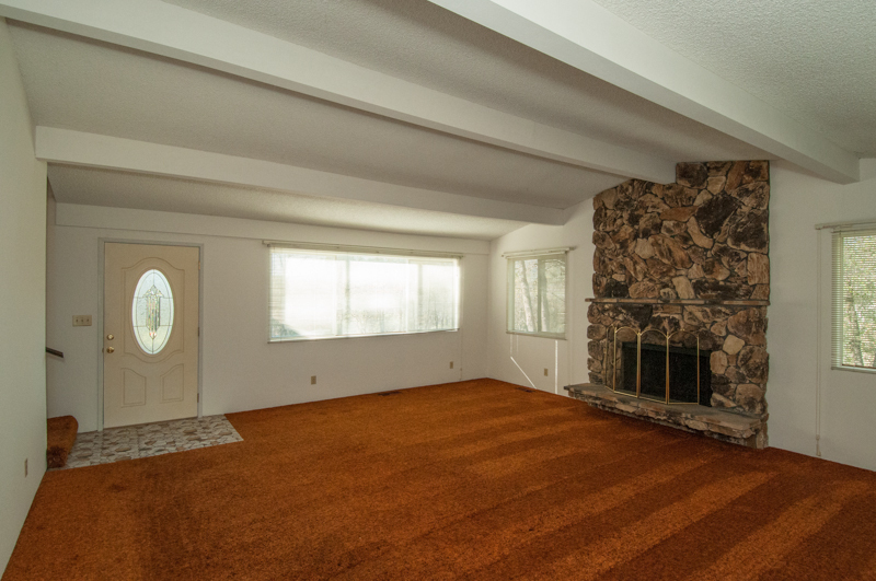 9083 Placer Road Redding, CA 96001 - Photo 2 of 23 Spacious living room with fireplace....