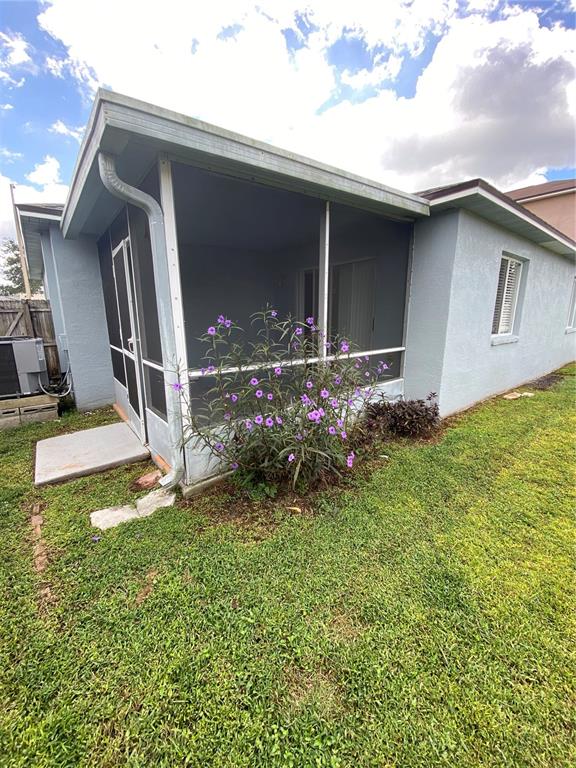 1258 Franford Drive Brandon, FL 33511 - Photo 16 of 20 a front view of a house with garden