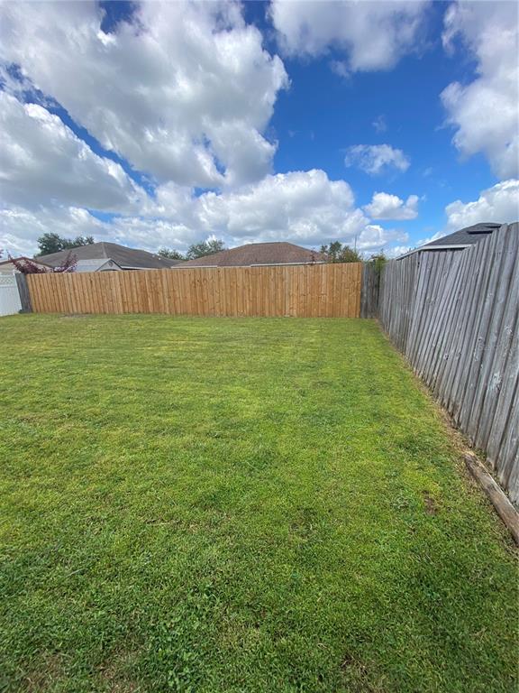 1258 Franford Drive Brandon, FL 33511 - Photo 19 of 20 a view of a pathway with a yard