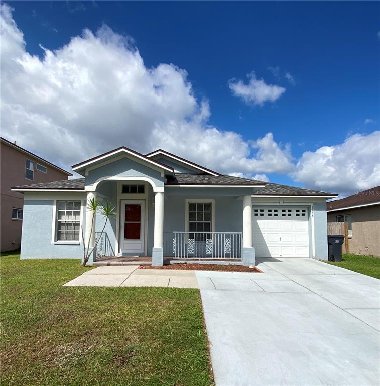 1258 Franford Drive Brandon, FL 33511 - Photo 2 of 20 a front view of a house with garden