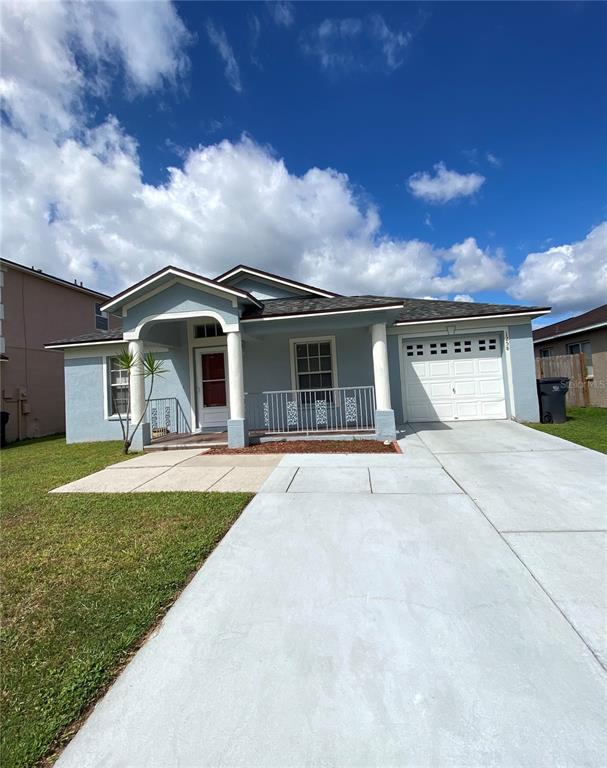 1258 Franford Drive Brandon, FL 33511 - Photo 3 of 20 front view of a house with a yard