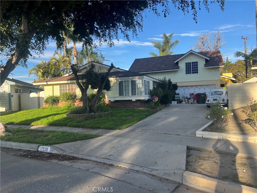 front view of a house with a garden
