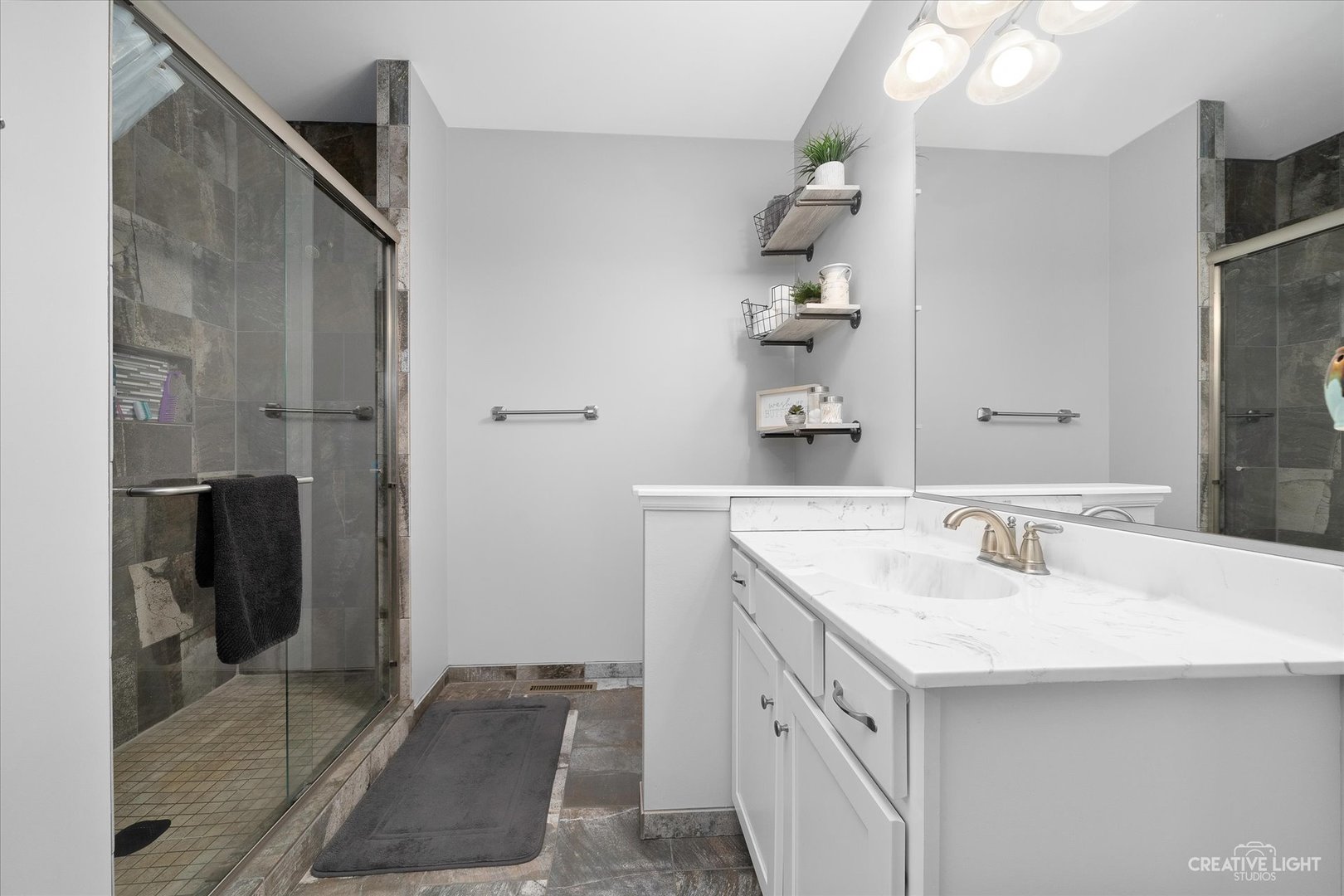 2969 4459th Road Newark, IL 60541 - Photo 15 of 35 a bathroom with a sink and a mirror