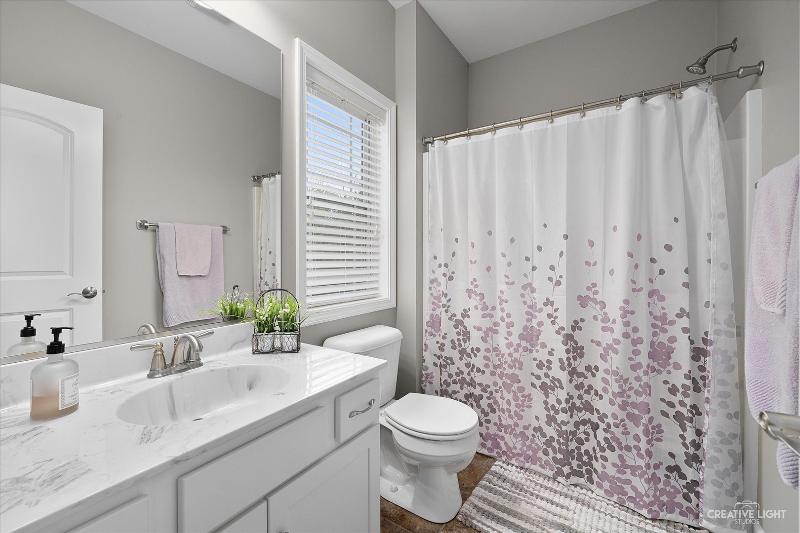 2969 4459th Road Newark, IL 60541 - Photo 16 of 35 a bathroom with a granite countertop sink a toilet and a mirror