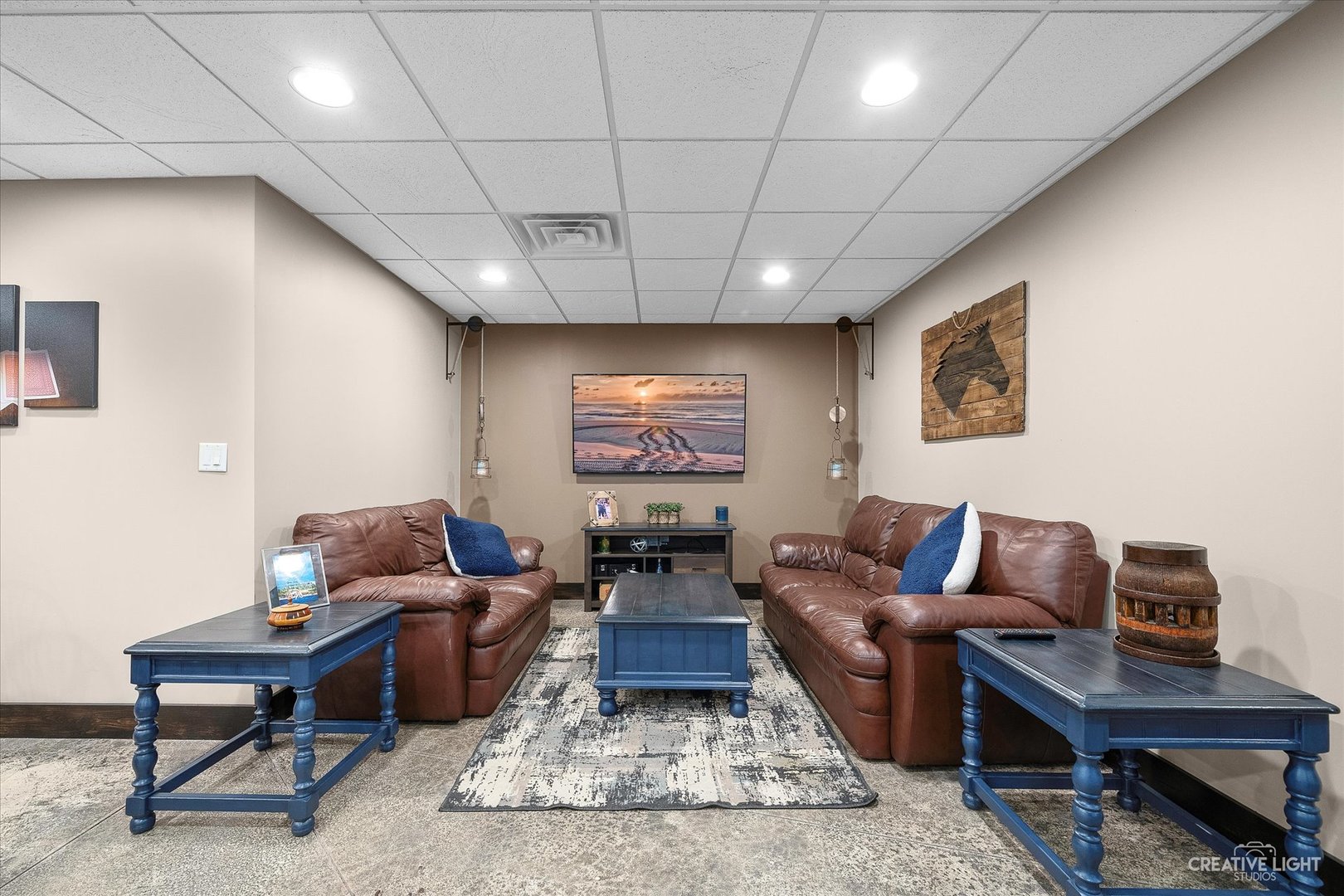2969 4459th Road Newark, IL 60541 - Photo 20 of 35 a living room with furniture a rug and a projector