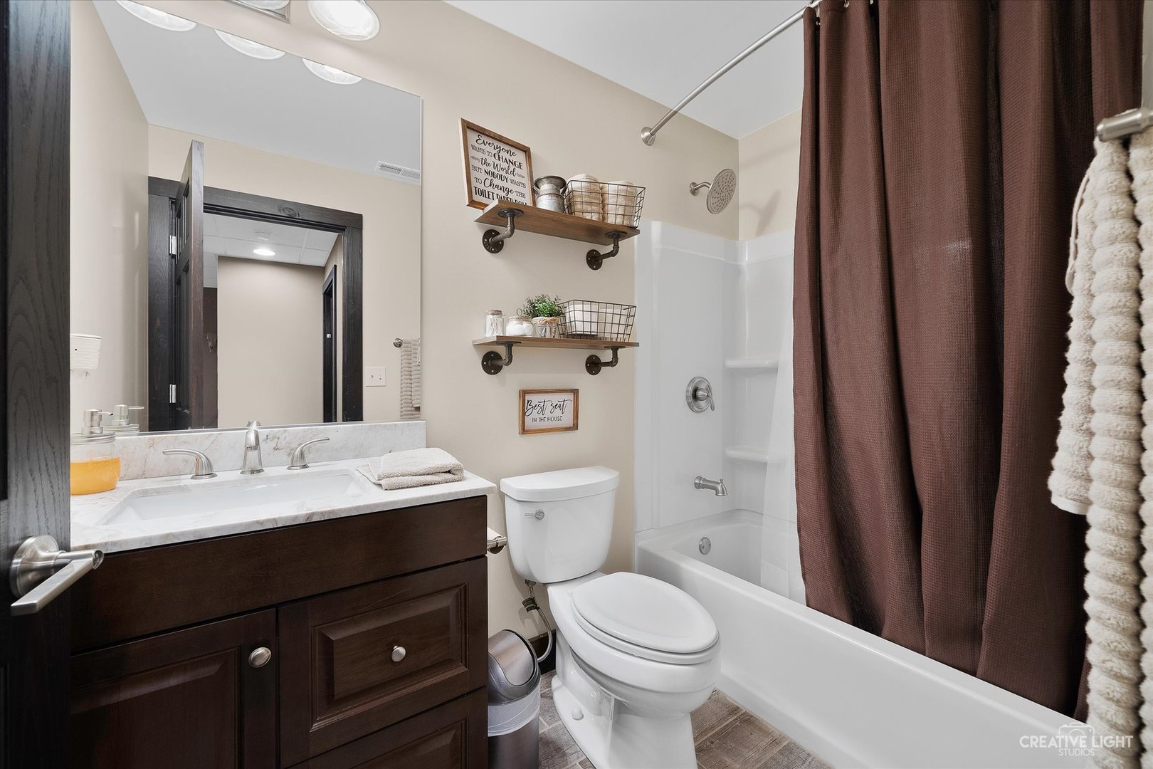 2969 4459th Road Newark, IL 60541 - Photo 25 of 35 a bathroom with a sink a toilet and shower