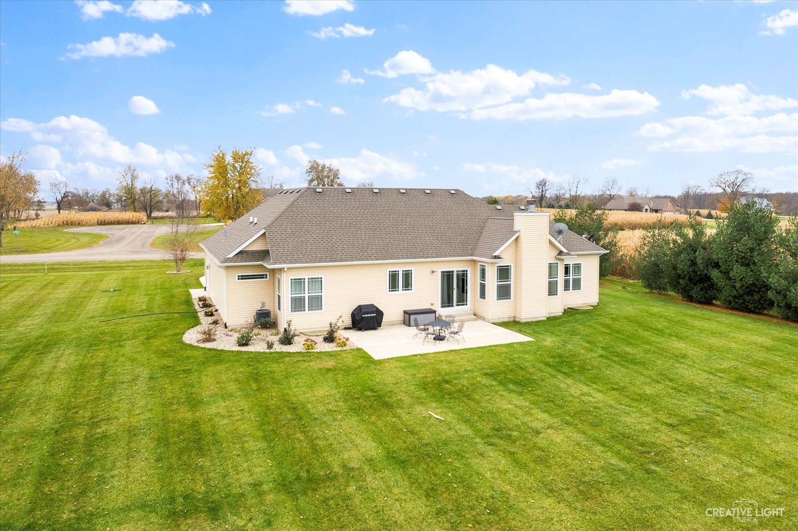 2969 4459th Road Newark, IL 60541 - Photo 29 of 35 a view of a house with a yard and sitting area