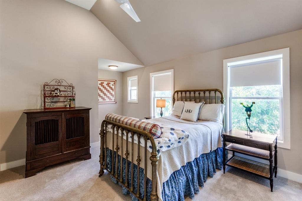 4206 Manning Lane Dallas, TX 75220 - Photo 24 of 35 a bedroom with a bed and a window