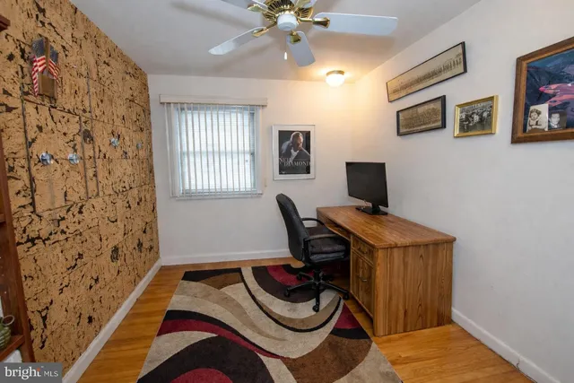 a workspace with furniture and window