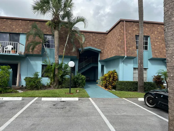 a house view with a garden space