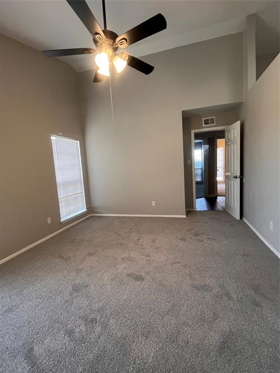 432 East Belt Line Road Cedar Hill, TX 75104 - Photo 15 of 30 a view of an empty room with a ceiling fan