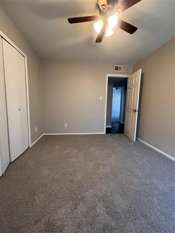 432 East Belt Line Road Cedar Hill, TX 75104 - Photo 23 of 30 a view of an empty room and chandelier fan
