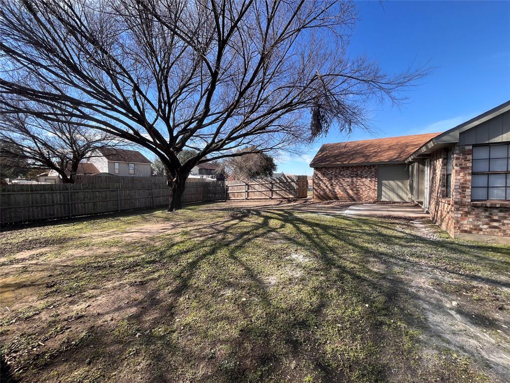 432 East Belt Line Road Cedar Hill, TX 75104 - Photo 29 of 30 a view of a house with a yard