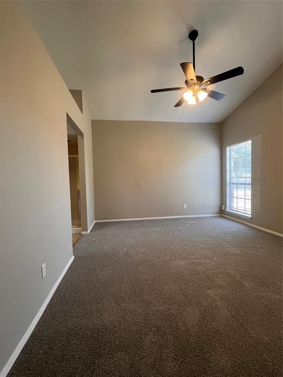 432 East Belt Line Road Cedar Hill, TX 75104 - Photo 5 of 30 an empty room with windows and fan
