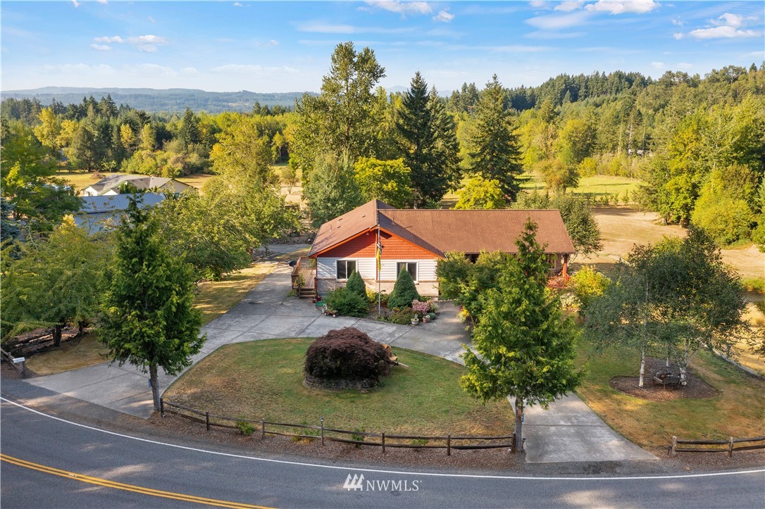 199 Jeffries Road Chehalis, WA 98532 - Photo 2 of 40 a view of a house with a yard and sitting area