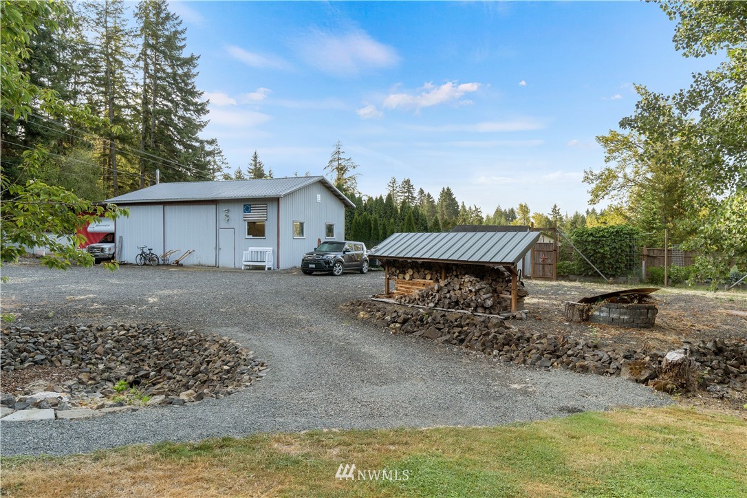 199 Jeffries Road Chehalis, WA 98532 - Photo 3 of 40 a view of a house with a yard and sitting area