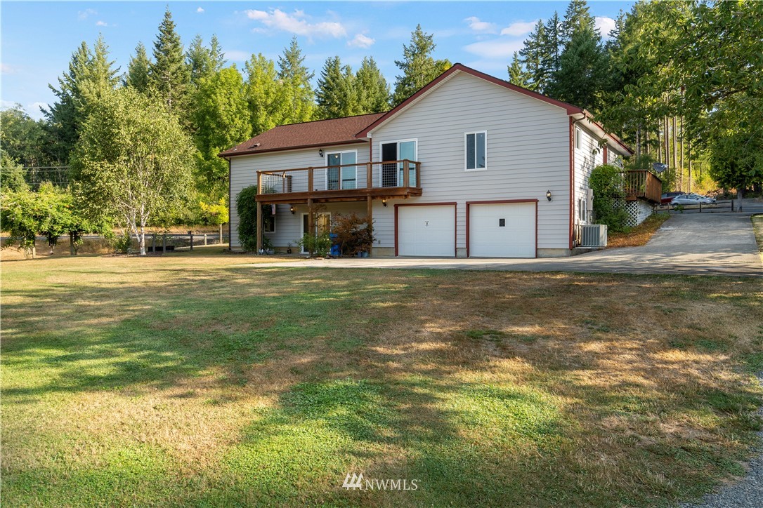 199 Jeffries Road Chehalis, WA 98532 - Photo 34 of 40 a front view of house with yard and trees around