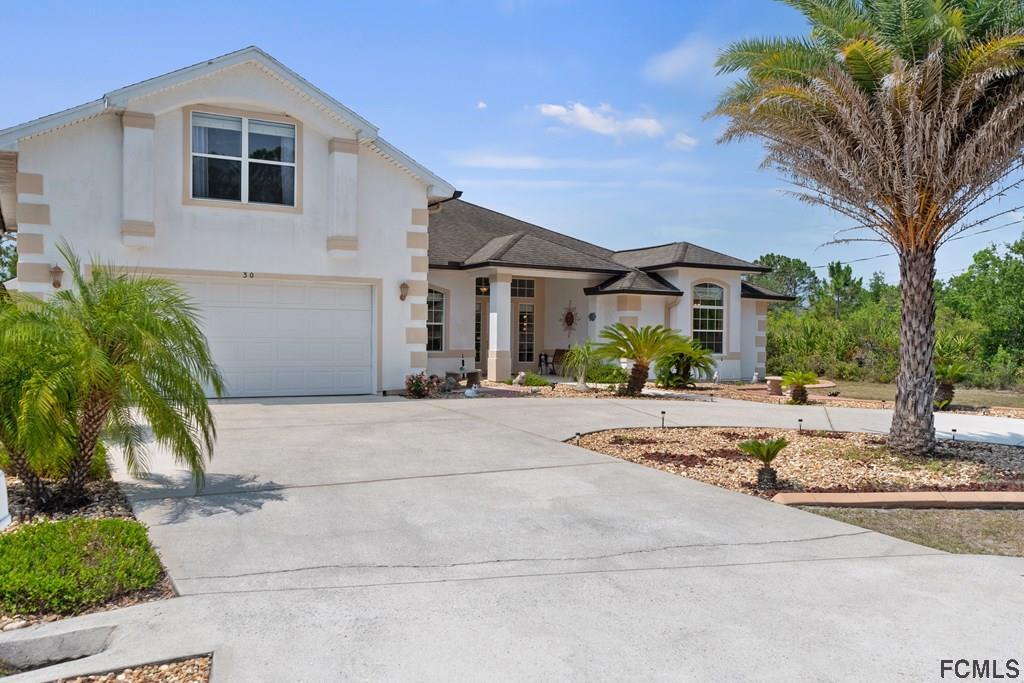 30 Rockefeller Drive Palm Coast, FL 32164 - Photo 1 of 65 Main View