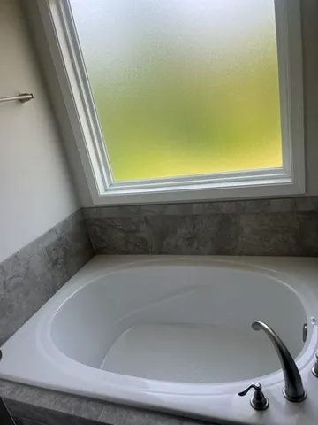 a bathroom with a bathtub
