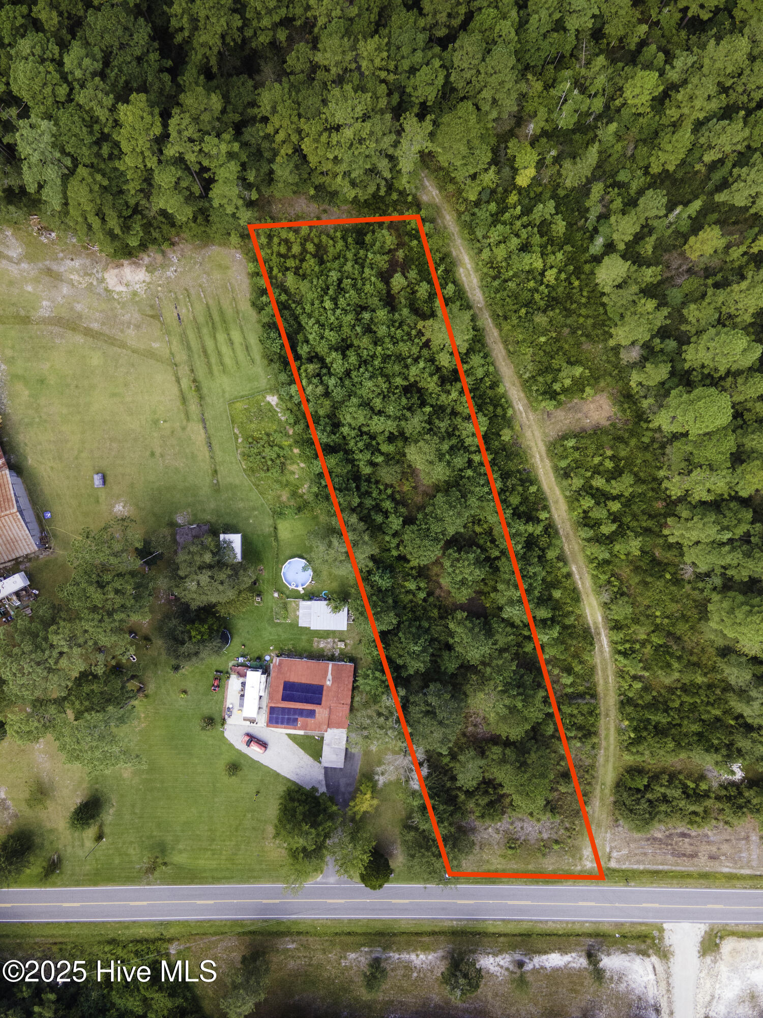 0 Nine Nine Mile Road Maple Hill, NC 28454 - Photo 1 of 13 1 Acre Road Front