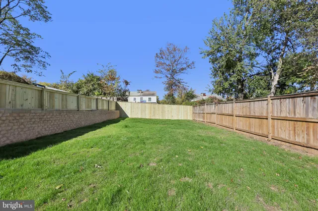a view of backyard with green space