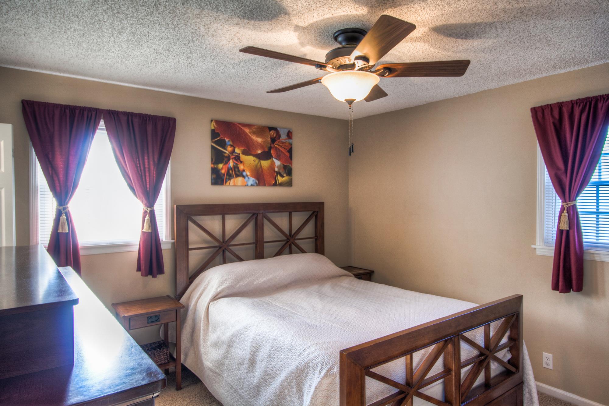 4509 Baton Rouge Drive Hermitage, TN 37076 - Photo 15 of 30 a bedroom with a bed and a chandelier