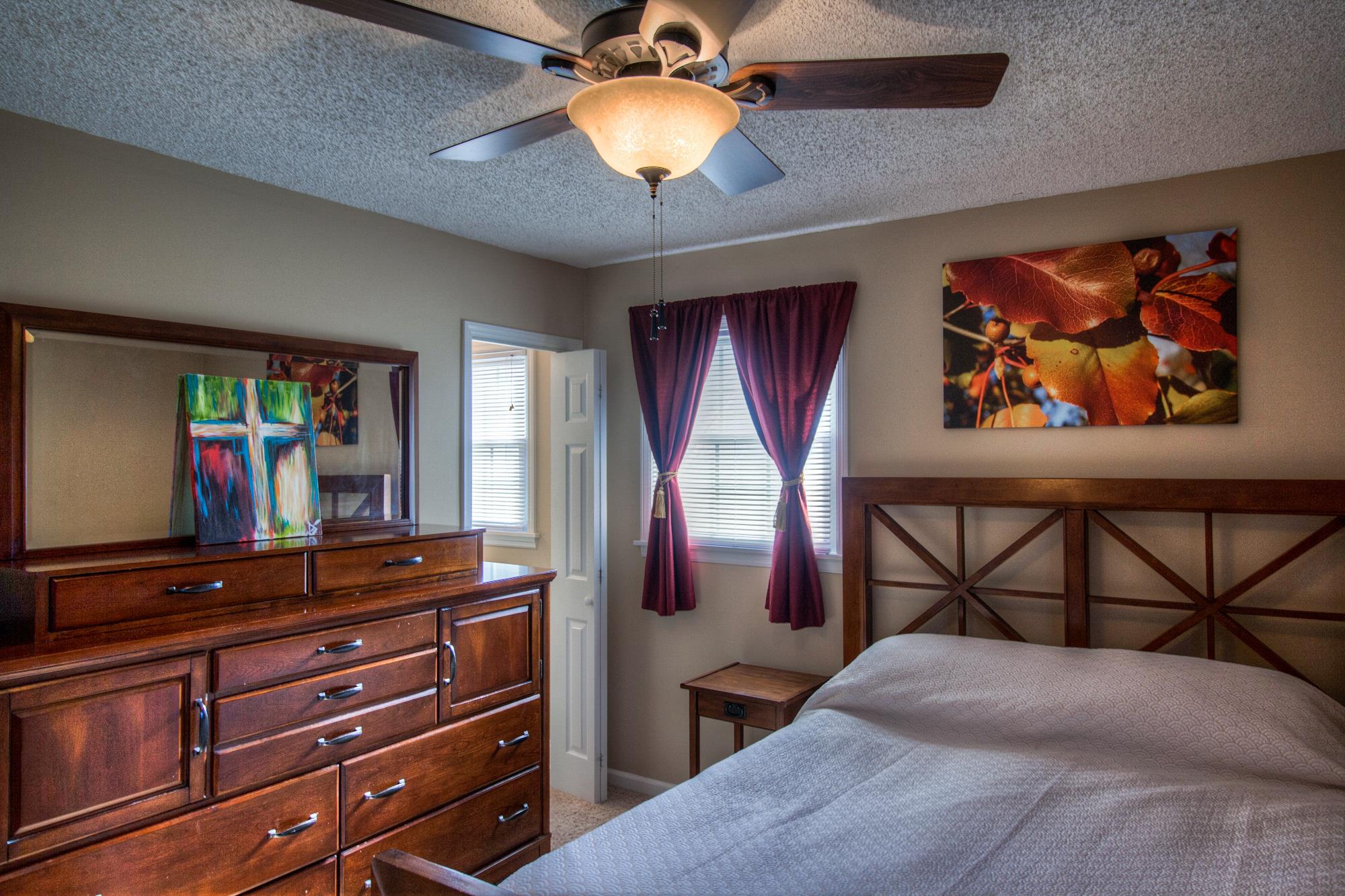 4509 Baton Rouge Drive Hermitage, TN 37076 - Photo 16 of 30 a bedroom with a bed and a flat screen tv