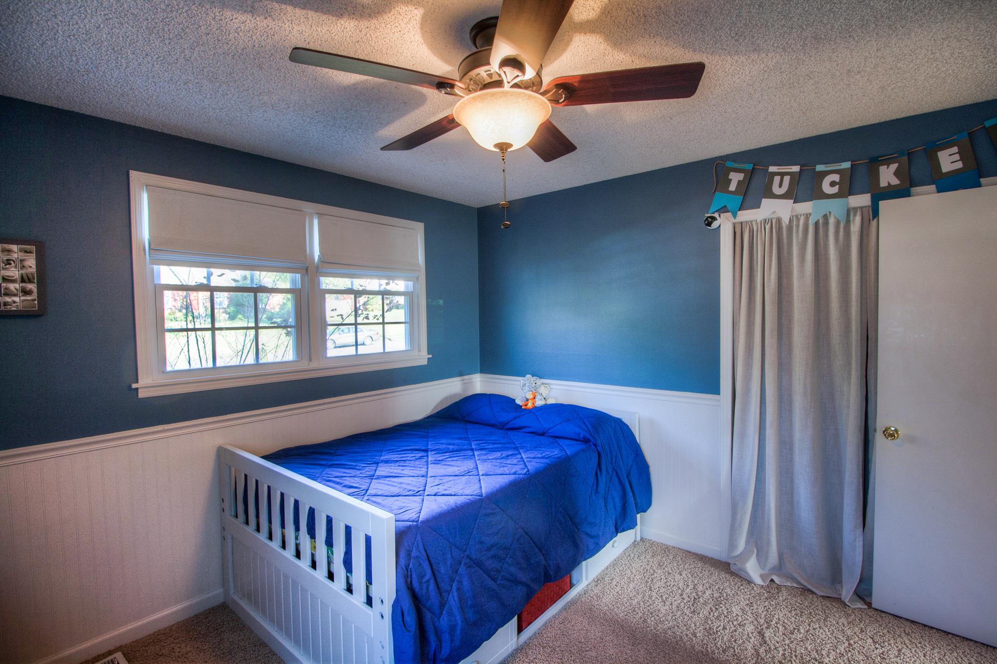 4509 Baton Rouge Drive Hermitage, TN 37076 - Photo 20 of 30 a bed sitting in a bedroom next to a window
