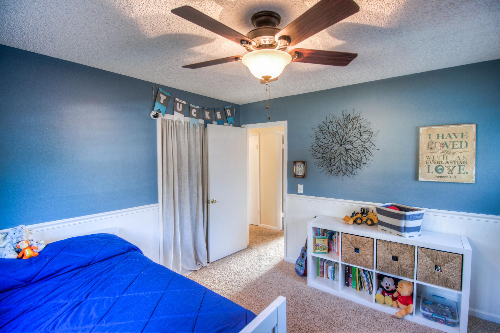 4509 Baton Rouge Drive Hermitage, TN 37076 - Photo 21 of 30 a view of an empty room with toys and wooden floor