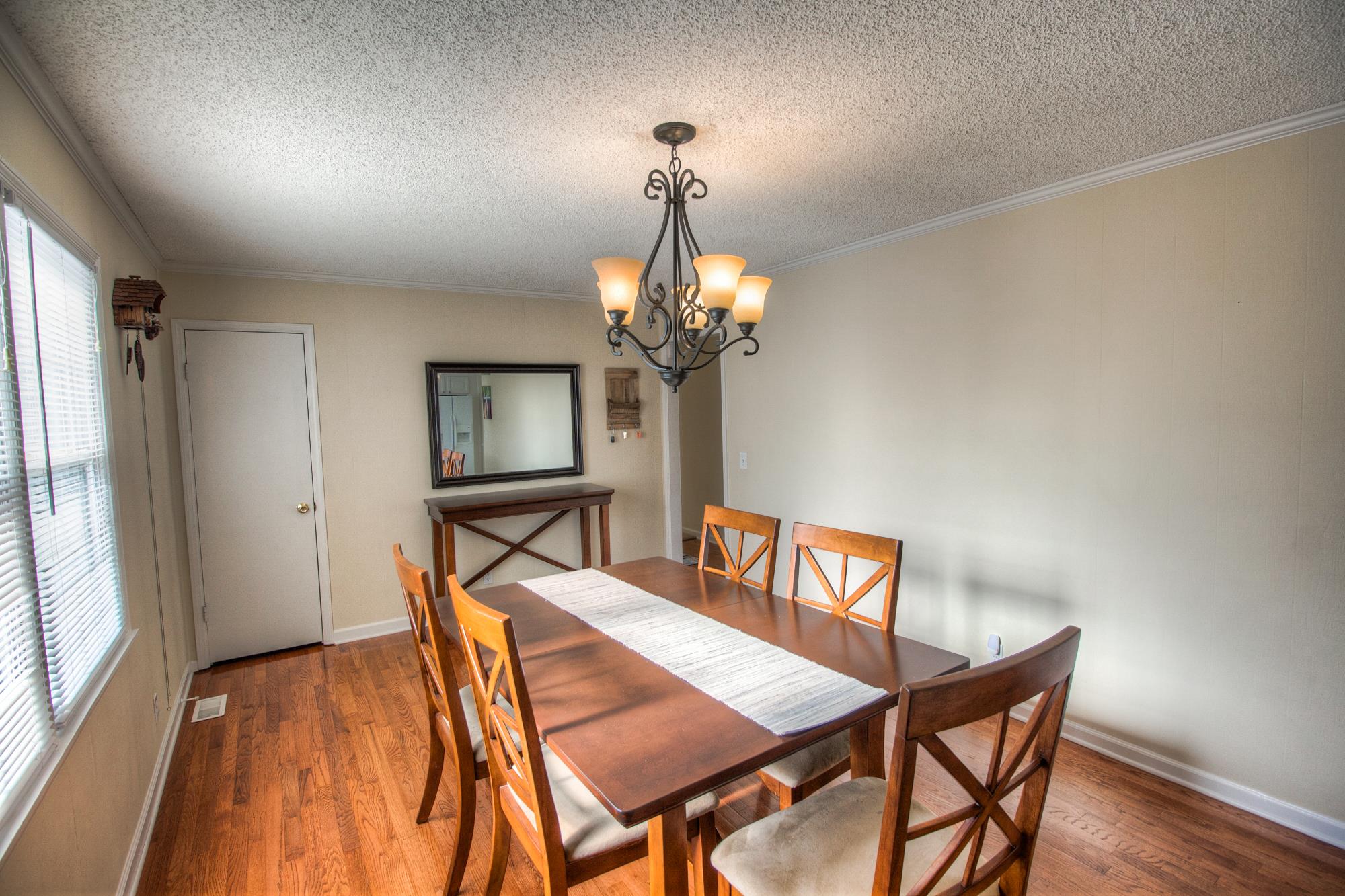 4509 Baton Rouge Drive Hermitage, TN 37076 - Photo 9 of 30 a view of a dining room with furniture and a chandelier