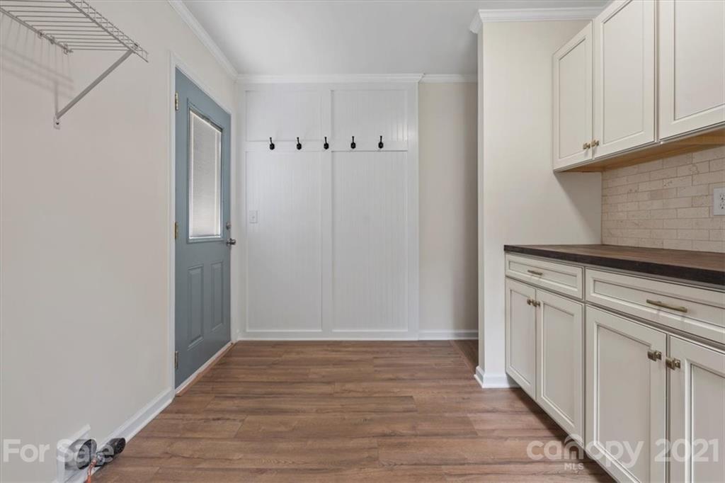 2665 Holbrook Road Fort Mill, SC 29715 - Photo 23 of 44 a view of a kitchen with wooden floor