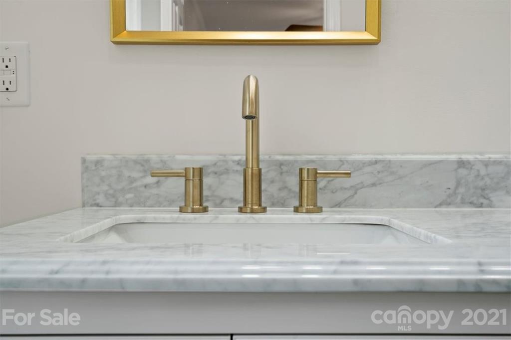 2665 Holbrook Road Fort Mill, SC 29715 - Photo 28 of 44 a bathroom with a sink and a mirror
